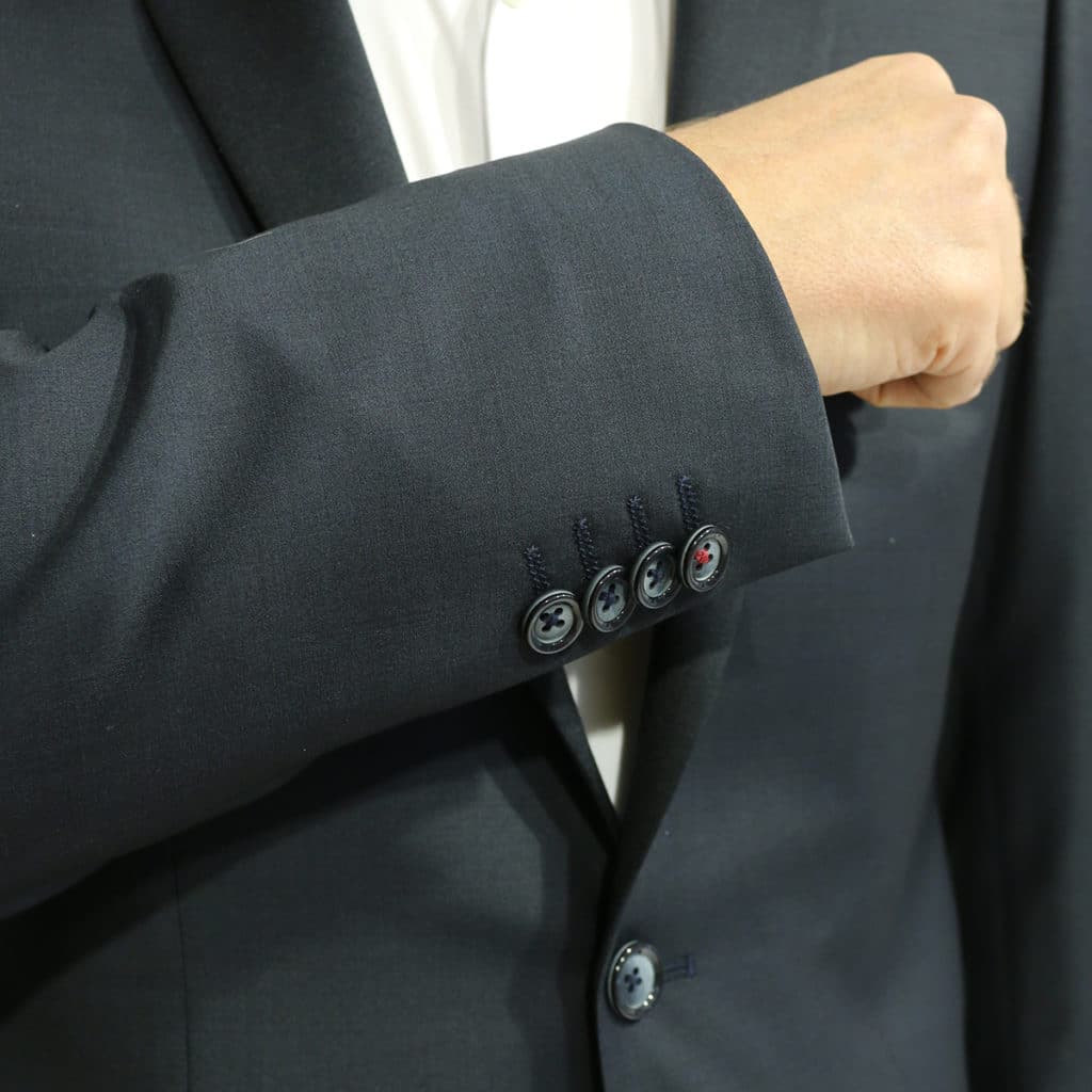 Roy Robson stretch button detail